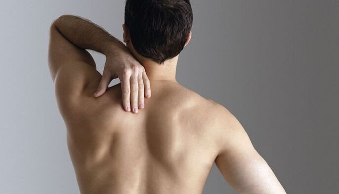 Back pain between the shoulder blades in a man